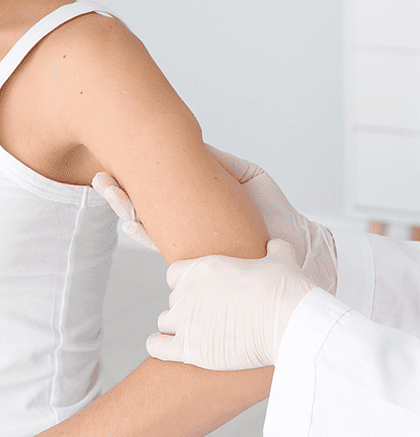 Dermatologist performing exam on patient for Folliculitis