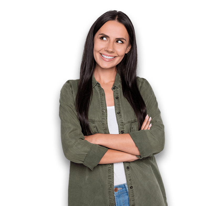 Austin woman with dark hair standing in a green shirt.