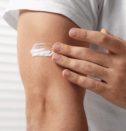 Dermatologist examining patient’s skin for eczema symptoms