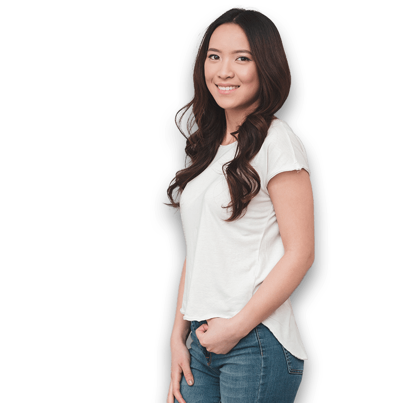 Woman standing with her hand in pocket.