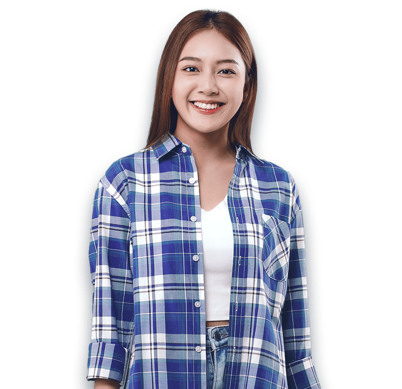 Woman in Austin standing in a flannel shirt with smile.