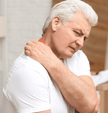 Dermatologist examining patient’s arm for contact dermatitis rash