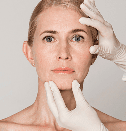 Dermatologist examining patient’s skin for lupus rash