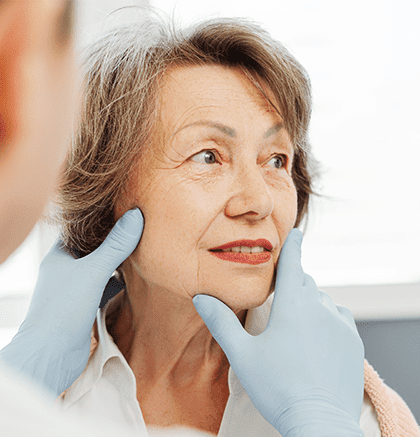 Dermatologist examining patient’s rash for shingles